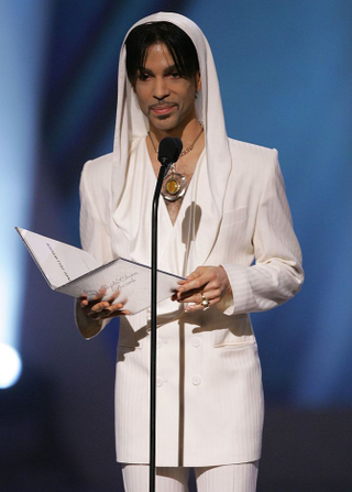 PASADENA, CA - JANUARY 9: Musician Prince presents the award for "Favorite Leading Lady" onstage during the 31st Annual People’s Choice Awards at the Pasadena Civic Auditorium on January 9, 2005 in Pasadena, California.